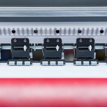 Industrial print head assembly on large format printer, Close-up of a modern print head assembly used in large format color printing